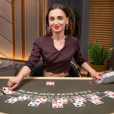 toto811 Infinite Blackjack live dealer studio with card table and multiple cameras